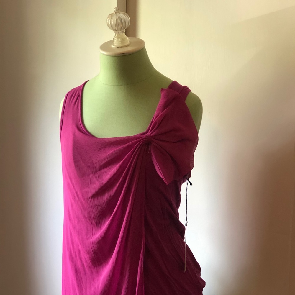 Pink top with bow and draped layer